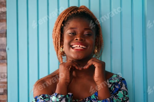Preview: Portrait of attractive black skin young woman, Charming Afro girl. Portrait of afro girl looking at