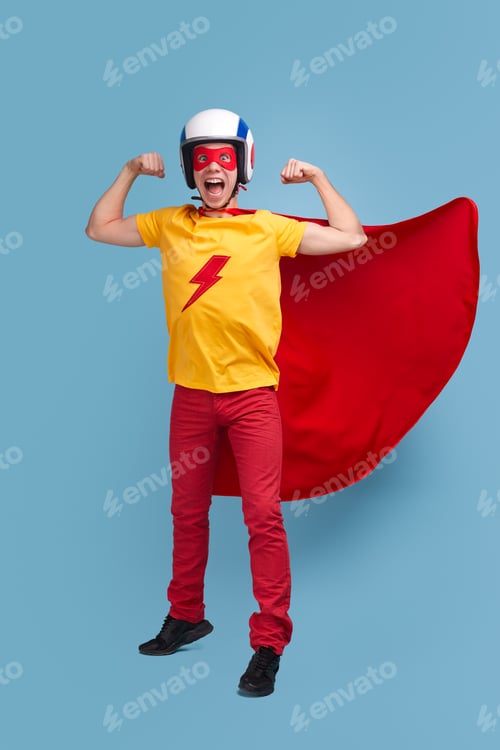 Preview: Strong comic superhero man showing biceps