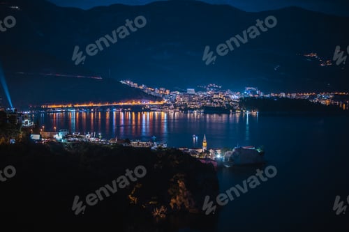 Preview: Scenic view of the cityscape of Budva, Montenegro at night.