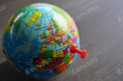 Preview: Close up image of push pin pointing at Gaza, Palestine on world globe.