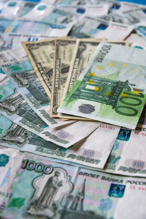 Preview: background of paper bills dollars, euros and rubles. Currency exchange rate