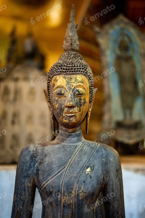 Preview: Ancient Buddha statue at Wat Visoun in Luang Prabang, Laos, Southeast Asia