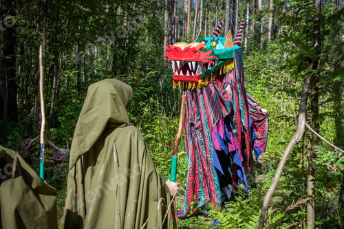 Preview: People in cloaks with staffs met a dragon in the forest, a quest