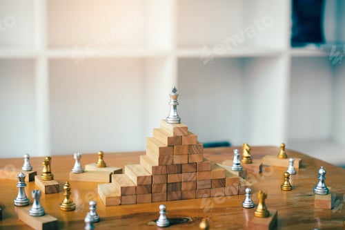 Preview: Leadership concept with king chess on top wooden block.