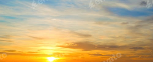 Preview: Mesmerizing view of the sunset in shades of orange on a clear sky