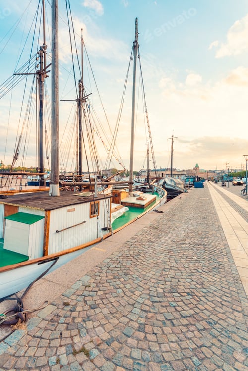 Preview: Strandvägen with anchored ships and historic buildings in the background in summer, stockholm