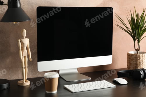 Vista previa: Computer, plant and wood man on wooden table. Workplace room