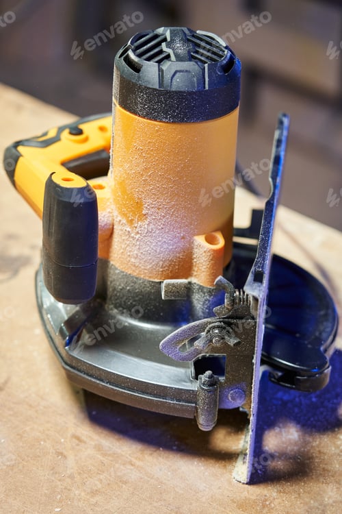 Preview: Circular Saw Covered with Sawdust on Work Surface