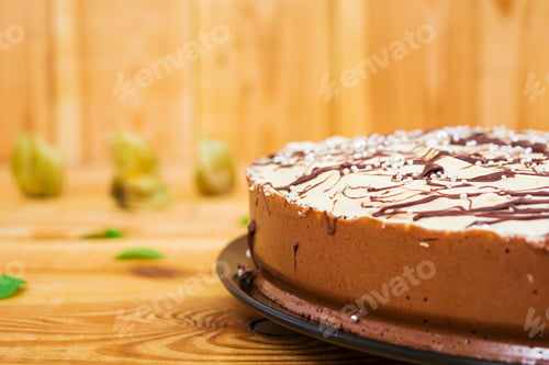 Preview: Cake pigeon's milk on wooden background
