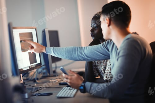 Preview: Programmers cooperating at information technology company