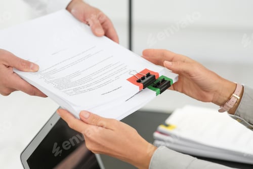 Preview: Woman giving documents to colleague in office, closeup