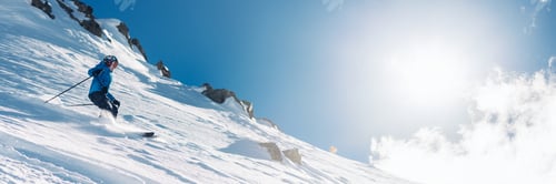 Preview: Skier on Sunny Slope with Copy Space Wide Banner