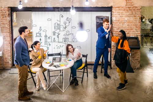 Preview: Business team working in a start-up office