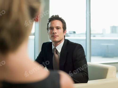 Preview: Businessman in conversation during a meeting