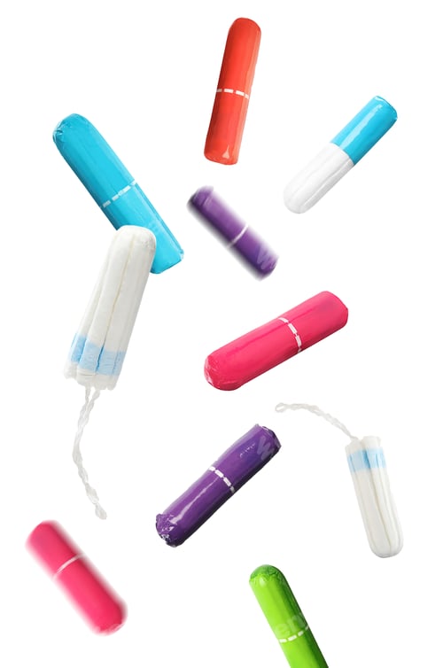 Preview: Many tampons falling on white background. Menstrual hygienic product