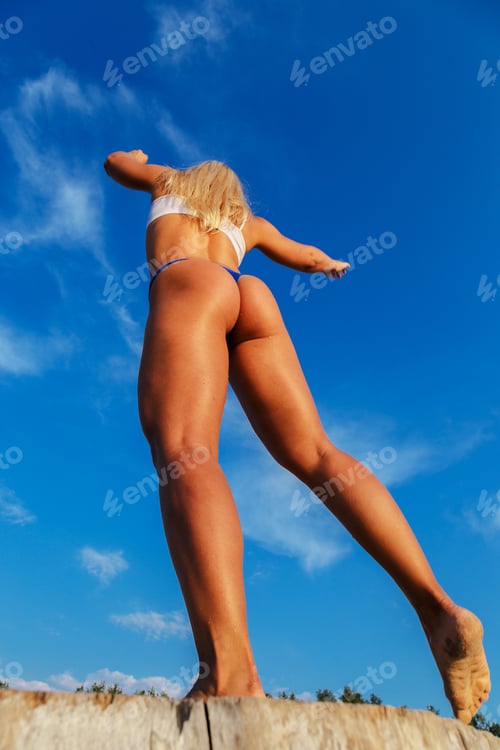 Preview: Sexy woman in swimwear on the beach.
