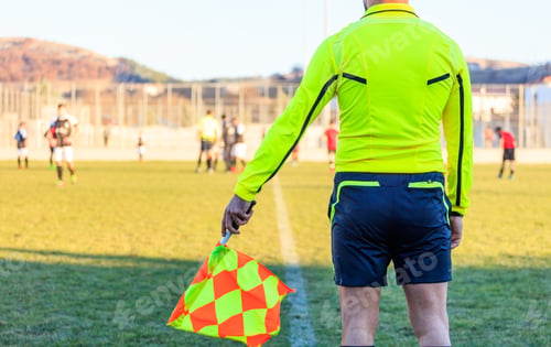 Preview: Football assistant referee in action