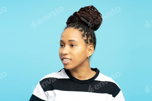 Preview: Woman with Braided Hair in a High Bun