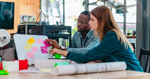 Preview: Diverse Startup Team Working on 3D Printing Project