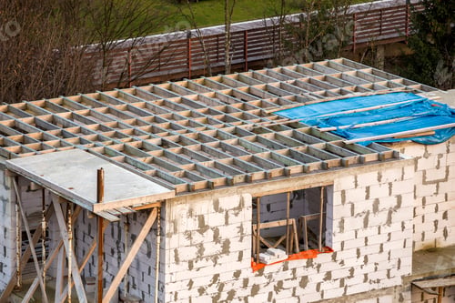 Preview: Building under construction. Roof beams frame and roofing underlayment, water-resistant waterproof