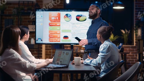 Preview: Company executive presenting analytics research in business meeting