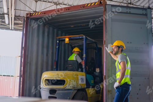 Preview: Blue collar workers are working at warehouse.