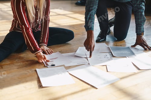 Preview: Paperwork on a wooden floor
