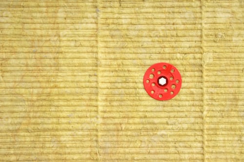 Preview: Green mineral wool with dowels with red plastic caps