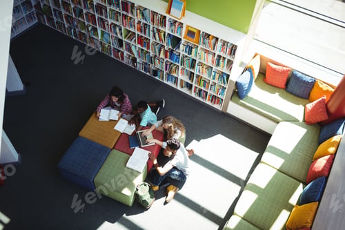 Preview: Attentive students studying in library