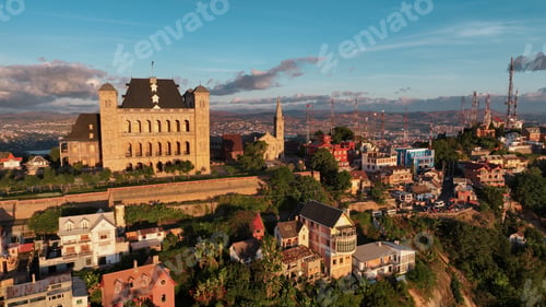 Preview: Aerial view of Antananarivo at sunset showcasing vibrant buildings and historical architecture