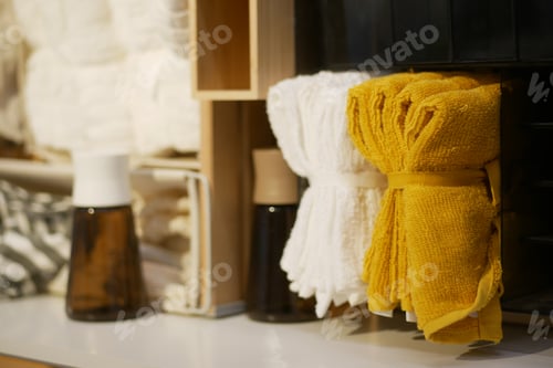 Preview: Display of towels and bottles in a store setting
