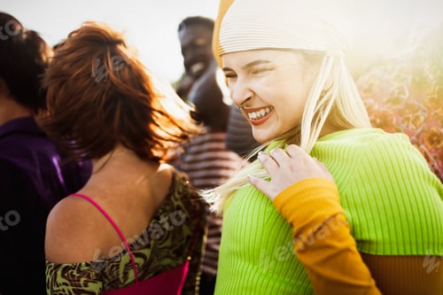 Preview: Happy young diverse friends having fun hanging out together