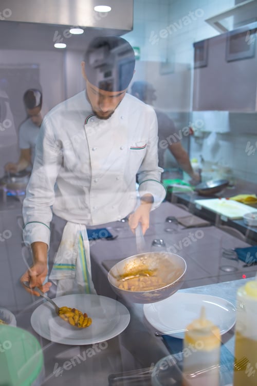 Preview: Young Chef Is Preparing A Typical Dish Of Pasta In The Restaurant. She Brings To The Table Good And