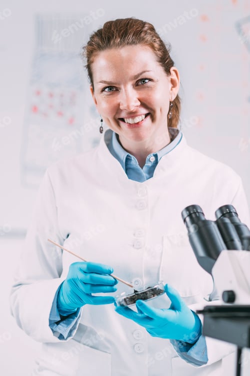 Preview: Portrait of Young Female Archaeologist in Laboratory