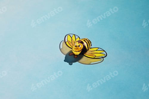 Preview: Candy cane bee with shadow. The concept of the Rosh Hashanah holiday