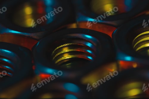 Preview: Screw nuts in a dark atmosphere with the red light coming under it