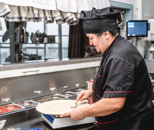 Preview: chef making pizza