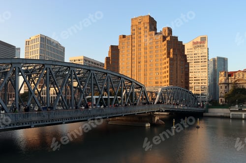Preview: Broadway Building near Huangpu River at Shanghai, China over water with a skyline in the background