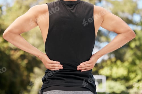 Preview: Athlete with back pain, injury or accident from sports match or training on an outdoor court. Fitne