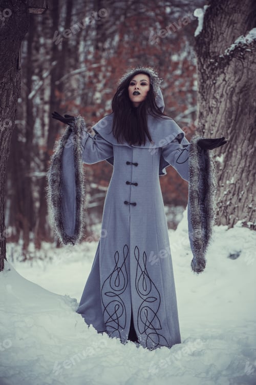 Preview: Fairytale Of Young Woman Dressed In Long Sleeved Coat At Winter With Snow Outdoors