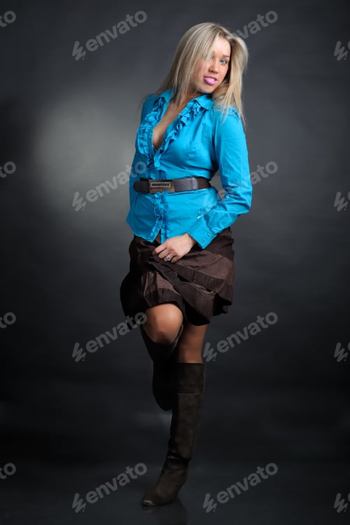 Preview: Woman In A Skirt On Black Background
