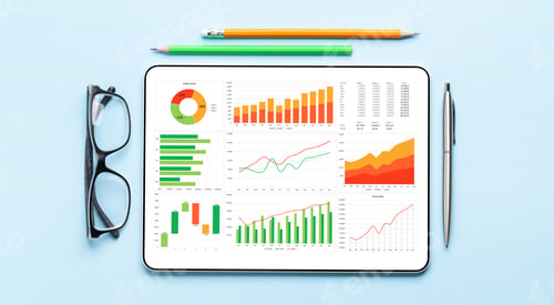 Preview: Tablet with business reports and charts