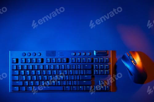 Preview: Computer keyboard and mouse on black background