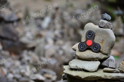 Preview: A wooden spinner lies on strange stone structures in the forest