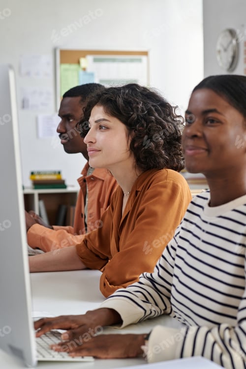 Preview: Portrait of Young Professionals Using Computer in Office Setting