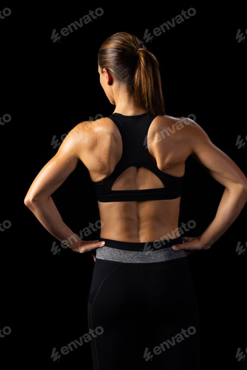 Preview: Athlete displays toned back, highlighting strength and health dedication.