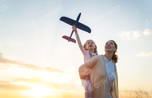Preview: Happy family at sunset