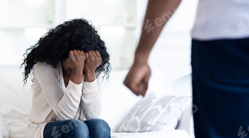 Preview: Woman Crying While Man Stands Behind Her
