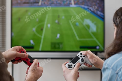 Preview: Boy playing video game with his mom