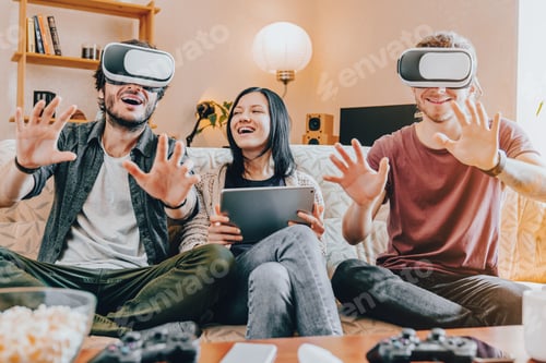 Preview: Group of friends using VR headsets at home interior, enjoying immersive virtual reality experience
